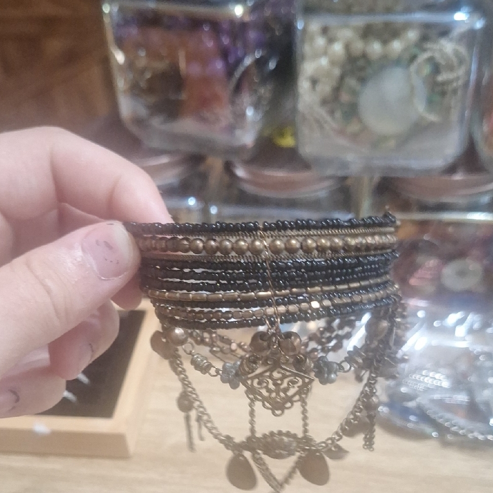 Vintage Black and Gold Bracelet with Antique Charm